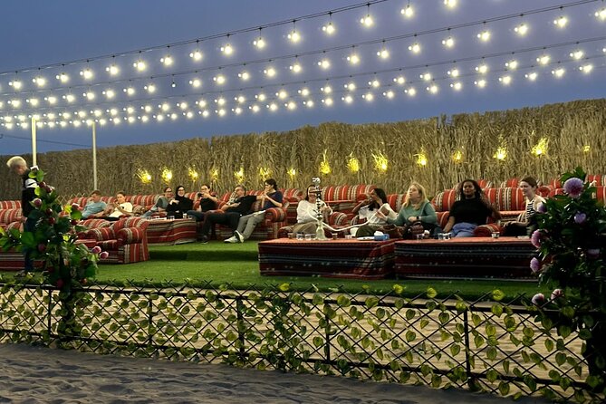 VIP Desert Safari Abu Dhabi with Private Seating Area - Arabic costume and falcon photographs