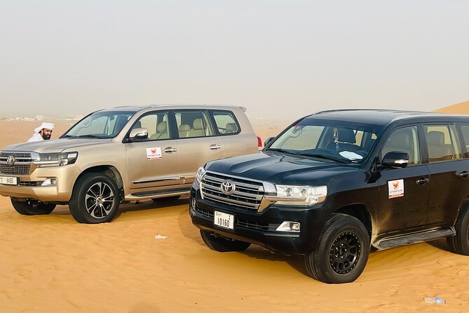 VIP Desert Safari with High Red Dune Bashing & Live BBQ Dinner - Sunset photos and sandboarding in Lahbab