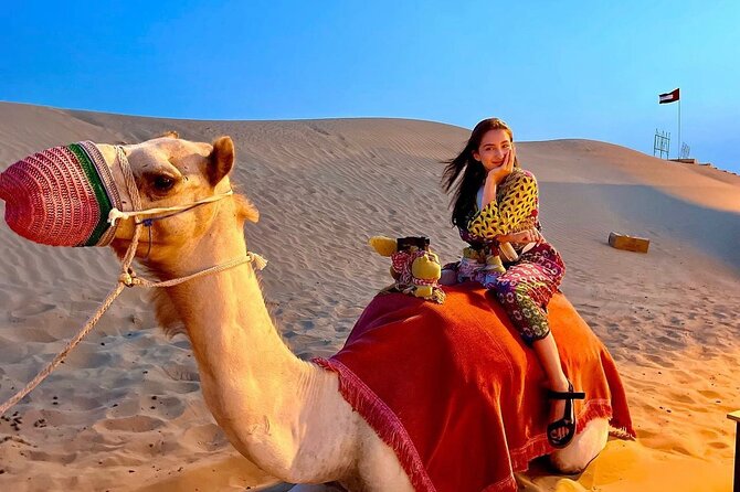 VIP Dubai Desert Safari with Quadbike,Sandboarding & BBQ dinner - Dinner and three shows fill the evening