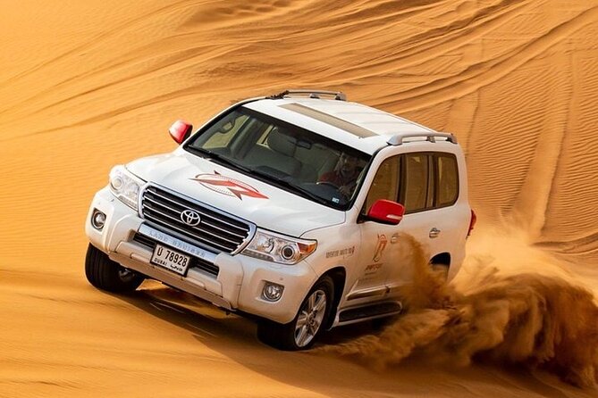 VIP Evening Desert Safari with Camel Ride & BBQ Dinner–Shared Car - Pickup in an air-conditioned 4x4