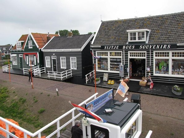 Volendam & Marken Private Tour in luxury Jaguar S Type 1/2 day - Volendam: fish, sweets, and a busy waterfront