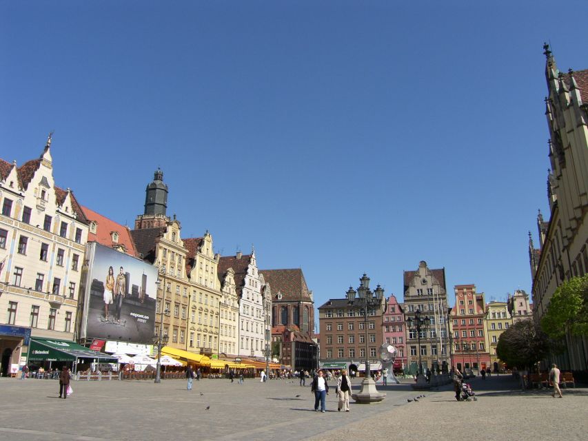 Wroclaw: City Walk and Cruise by Luxury Solar Catamaran - Wrocław Market Hall and the route toward the islands