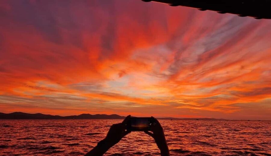 Zadar: Romantic, Luxury Sunset Boat Tour with Aperol Spritz - Leaving Foša Harbor Beside the Land Gate